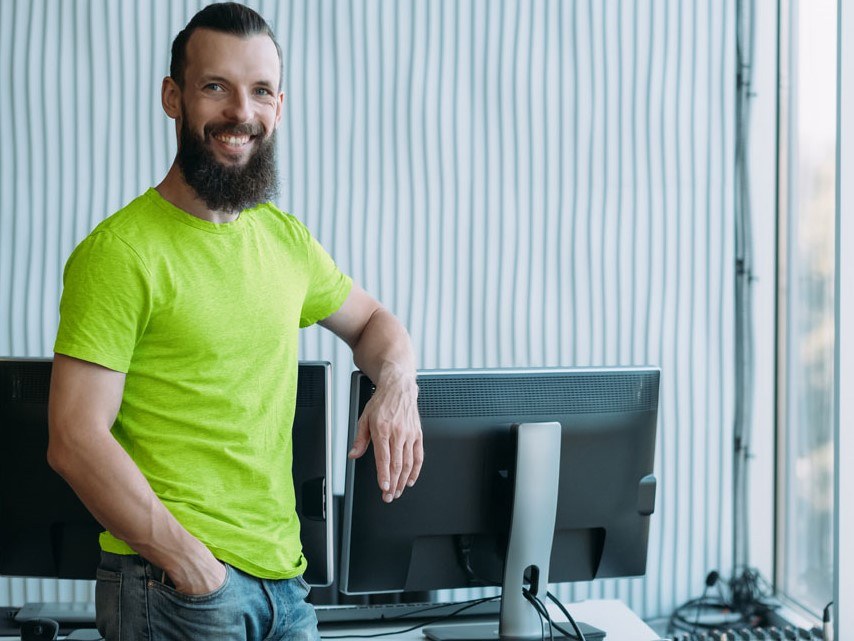 Smiling-customer-in-his-estimating-office-lime-cropped