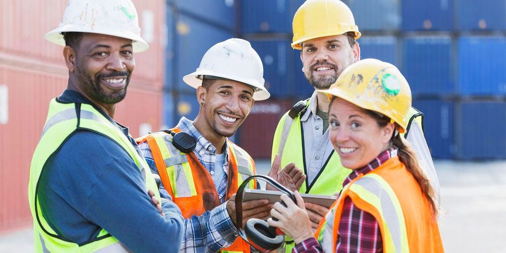 Estimators-smiling-on-a-jobsite